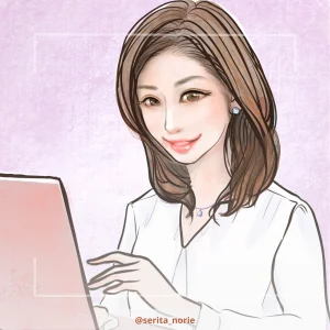 パソコンの作業をしている白いブラウスの女性のイラスト