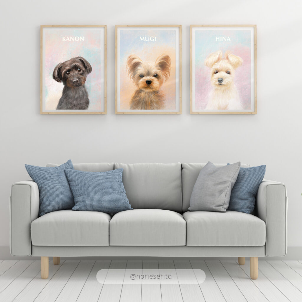ソファーの上に飾られた犬の３兄弟の似顔絵
